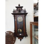 Victorian walnut cased Vienna wall clock.