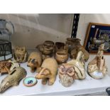 Various stylised and natural Studio pottery money boxes and animals to include Tremar, Bennetts