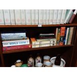 Shelf lot of books, topical to stamp and coin collecting.