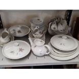 A comprehensive Royal Doulton Tumbling Leaves pattern dinner service comprising 10 place settings, 3