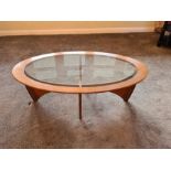 Mid Century G Plan oval astro coffee table, 122cm long x 42cm high.