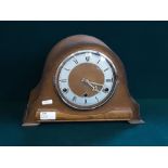 1930's oak cased chiming mantle clock.