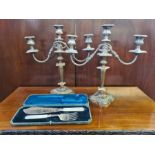 Large pair of worn EPNS candelabra and a pair of engraved EPNS mother of pearl handle fish servers