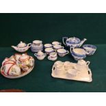 Tray lot comprising 3 porcelain dolls teasets, miniature Wedgwood willow pattern teapot, cream and