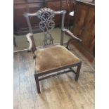 Georgian Gothic Chippendale broad arm carver chair with carved top rail, fine pierced central