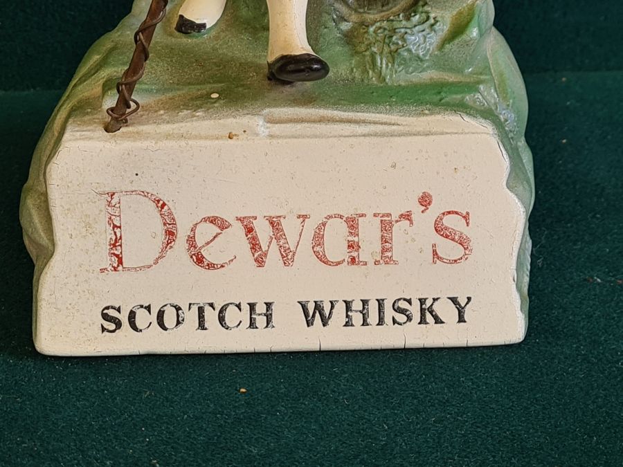 A counter top composition Dewar's White Label Scotch Whisky advertising figure. - Image 2 of 5