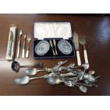 Cased set of cut glass butter dishes and assorted EPNS and mother of pearl handled cutlery.