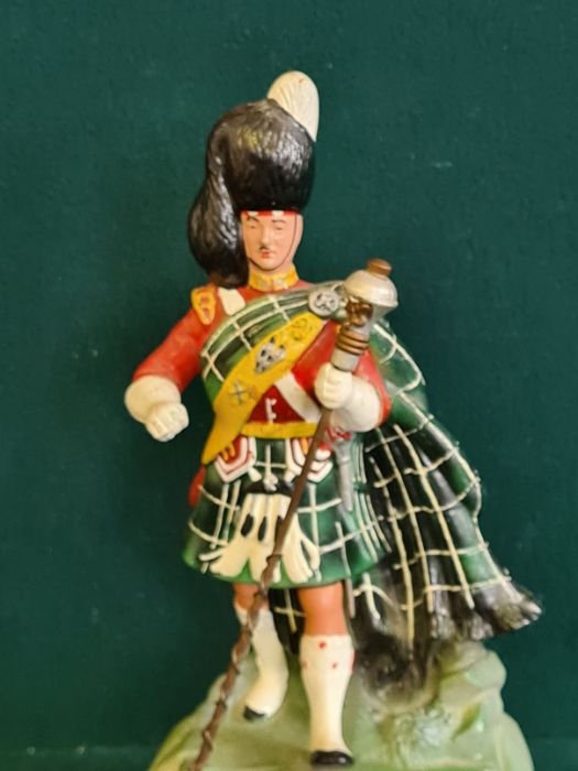 A counter top composition Dewar's White Label Scotch Whisky advertising figure. - Image 3 of 5