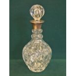 Globular cut glass decanter with silver collar, 29cm tall by Charles Green & Co., Birmingham.