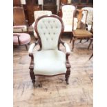 Victorian mahogany button spoon back armchair.