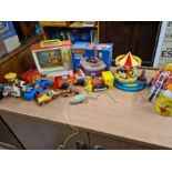 A box lot of vintage 1970's toys including Fisher Price t.v. and fire engine, Matchbox Stack a Cake,