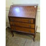 1930's mahogany quarter veneered fall front bureau on Queen Ann legs.