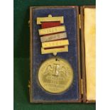 Victorian school attendance medal with 3 year clasps in fitted case.