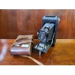 Leather cased Eastment Kodak No. 1A autographic folding camera.