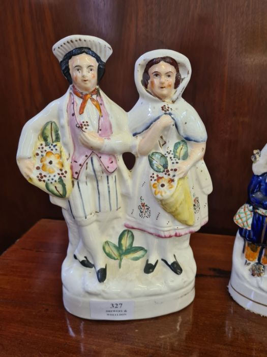 Staffordshire flat back figure, flower sellers and a spill vase of a Scottish couple. - Image 3 of 5