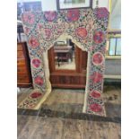 A large Victorian embroidered doorway drape and a similar 2.4m x 1.6m embroidered drape.