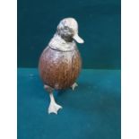 An unusual brass and coconut shell inkwell in the form of the web footed bird.