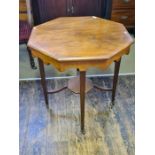 Edwardian walnut hexagonal 2 tier window table upon tapering straight leg.