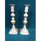 A pair of 9.5" beehive and diamond brass candlesticks.