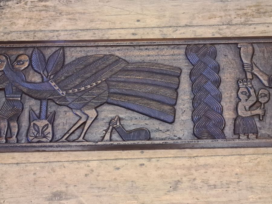 Tribal carved teak long panel depicting large harnessed mythical bird, beheadings and worship. - Image 3 of 4