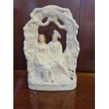 Victorian Staffordshire flat back figure of a courting couple standing 14" high.