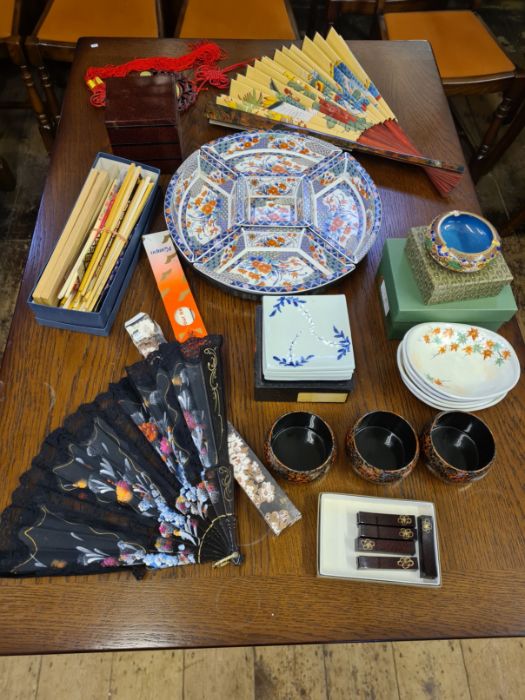 Box lot of oriental lacquered and porcelain dishes, coasters, quantity of assorted chopsticks,