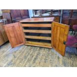 An oak 2 door linen press with 4 slider drawers, 110cm wide x 103cm tall.