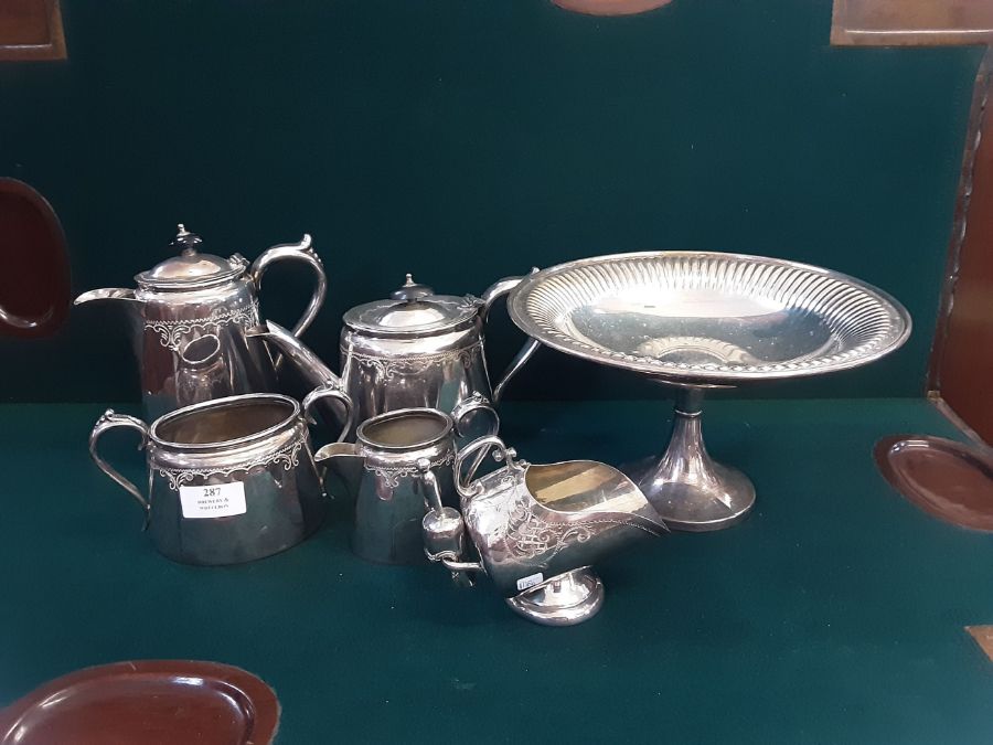 EPBM 4 piece chased decorated tea service with similar sugar scuttle and scoop and a fluted