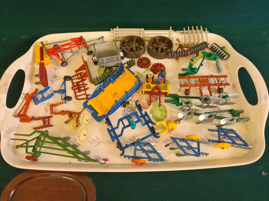 Tray lot of Britains farm implements and parts.