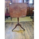 Georgian mahogany gun barrel tripod base tilt top occasional table.