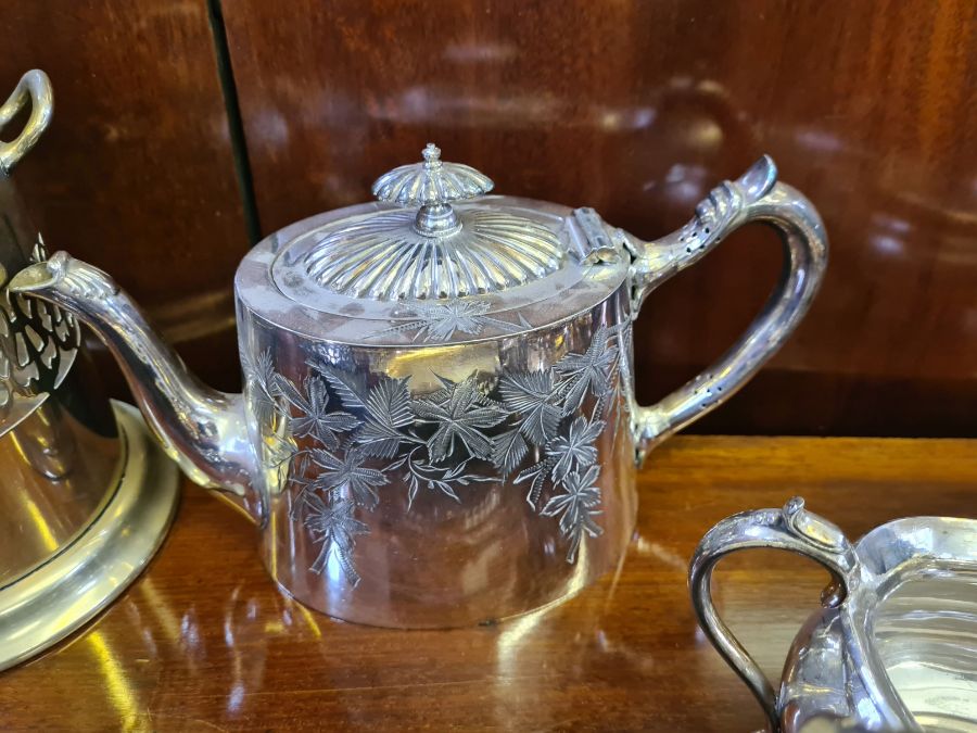 Assorted plated wares to include cake baskets, bottle holder, EPBM chased teapot, sugar and cream - Image 4 of 6