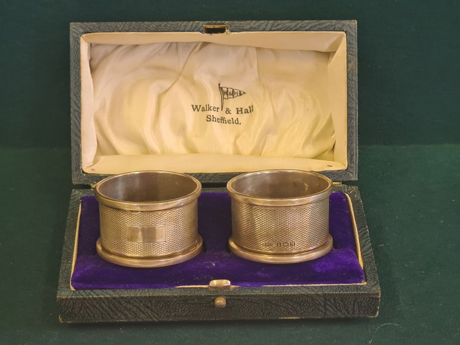 A pair of Broadway & Co engine turned napkin rings, Birmingham 1936 in associated Walker & Hall