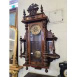 Large Victorian walnut Vienna wall clock with wrythen columns and Eagle pediment with mirrored