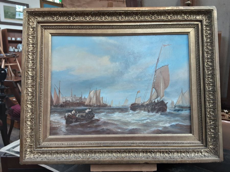 An early 20th century unsigned oil on canvas continental harbour scene on rough seas, 35cm x 26cm.