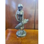 20th century cast bronzed metal figure of a farm girl with a sheath of wheat.
