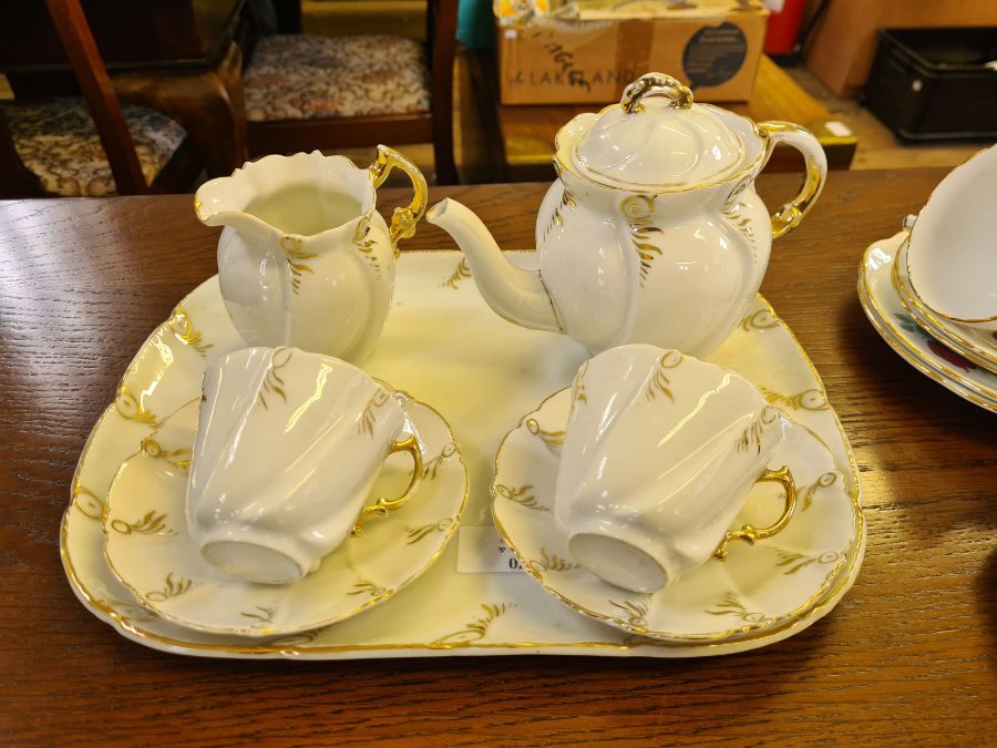 Gilt decorated porcelain tete a tete teaset and 2 gilt floral teasets. - Image 2 of 5
