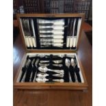 Walnut cased canteen of cutlery comprising 6 complete place settings, 39 pieces in all.