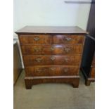 An early 18th Century walnut chest of 5 drawers, quarter veneer figured walnut top with geometric