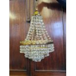 Gilt metal and crystal glass 4 ring and tent chandelier, 25cm diameter, 40cm crystal drop.