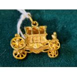 9ct gold Cinderella coach charm, 3.4g.