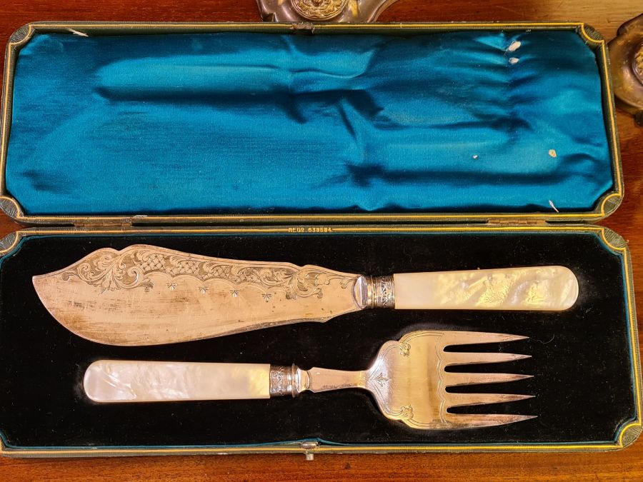 Large pair of worn EPNS candelabra and a pair of engraved EPNS mother of pearl handle fish servers - Image 2 of 3