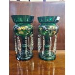 Pair of Victorian green gilt lustres standing approx. 22.5cm tall, slight chipping to top rims.