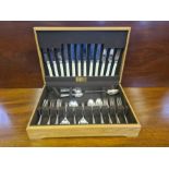 An oak cased canteen of Garrard & Co. EPNS cutlery.