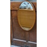 1930's oak framed bevel edged wall hanging mirror.