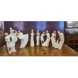 A set of 6 Daisy Chain stages of life figurines.