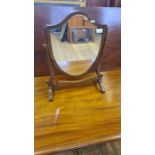 Victorian mahogany shield shaped table mirror.
