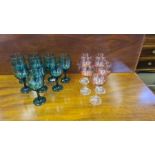 Set of 8 smoked green wine glasses and 5 pink glasses.
