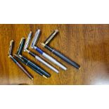 A pair of Parker Sonnet fountain and ballpoint pens and other Parker and Waterman fountain pens.