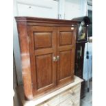 Georgian oak two door fielded panel corner cupboard.