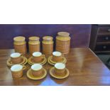 1970's Hornsea Saffron storage jars and matching teacups, saucers and side plates.